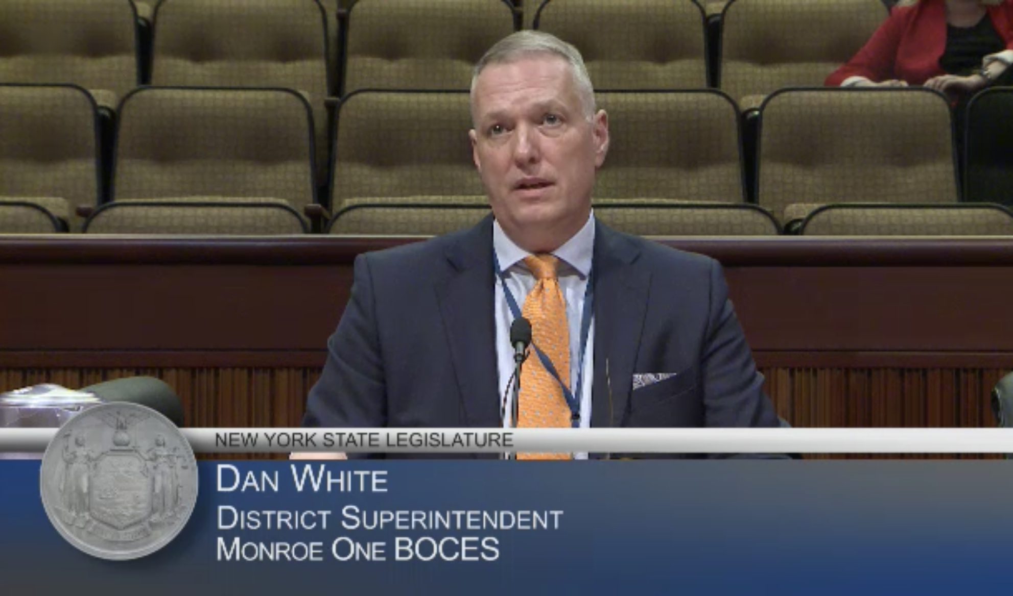 District Superintendent Dan White speaking in front of the senate