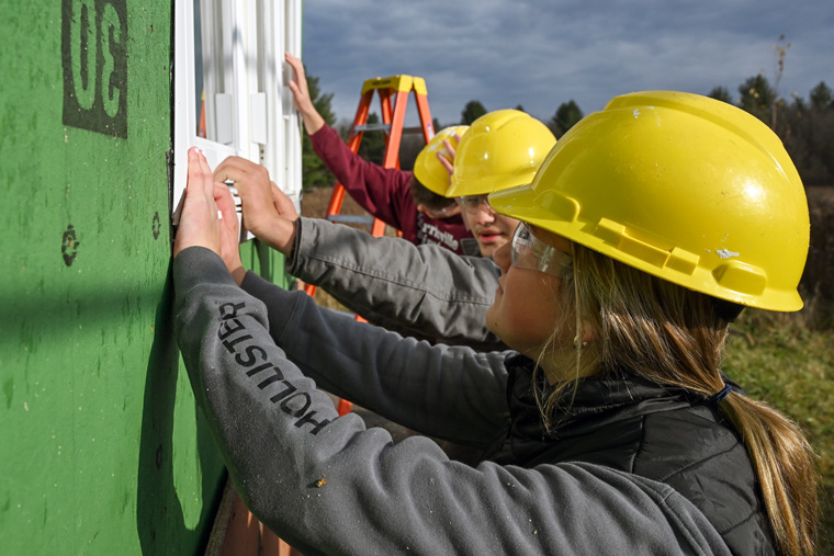 students working on construction project