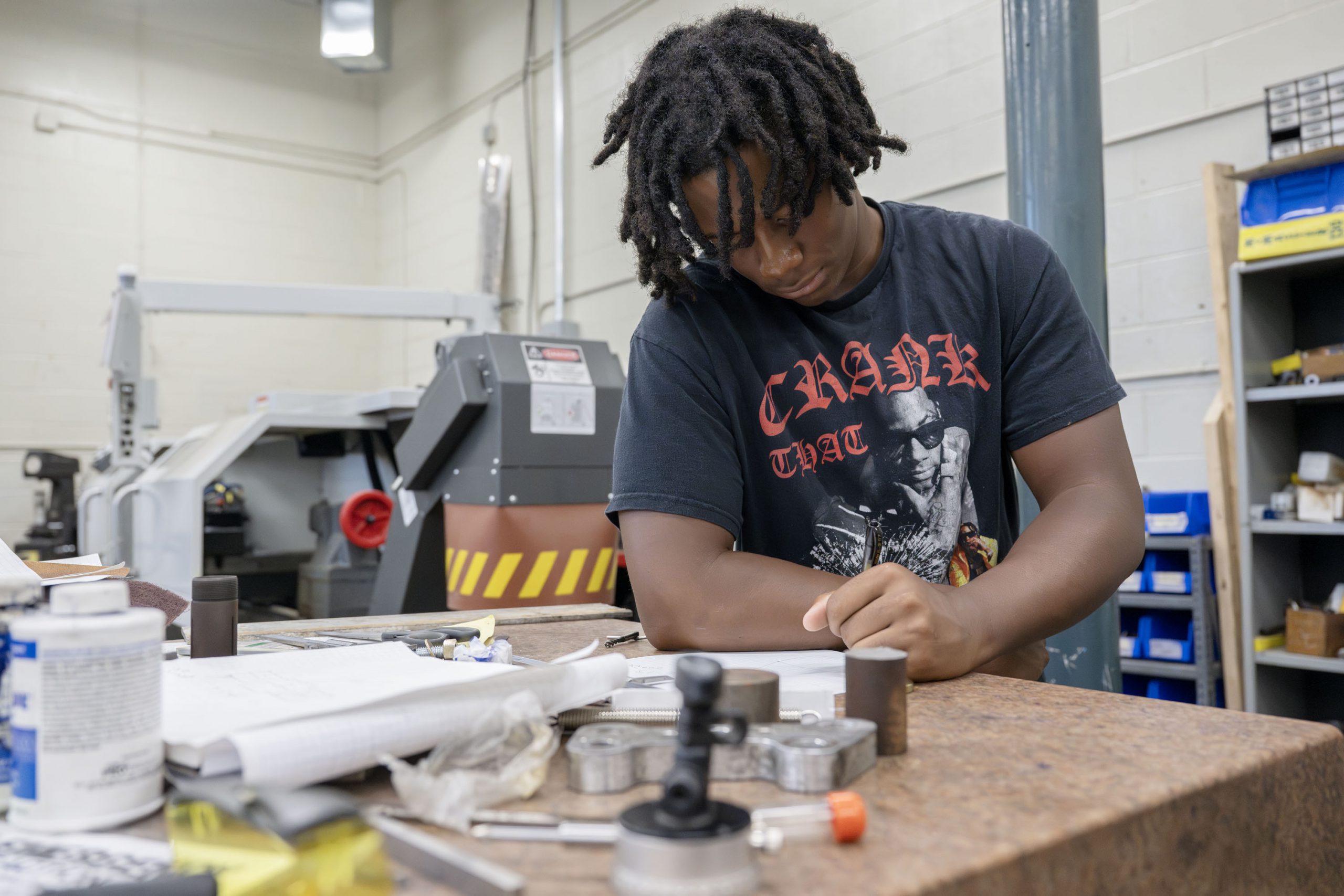 Herkimer BOCES student looks over materials in Advanced Manufacturing program